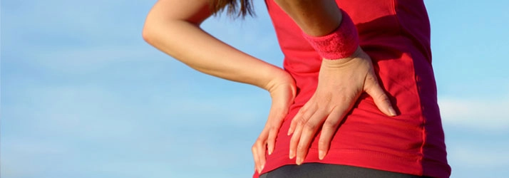 Chiropractic Arlington TX Woman With Low Back Pain